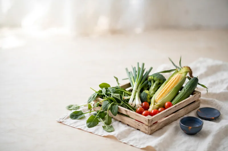A crate of fresh vegetables (illustration)